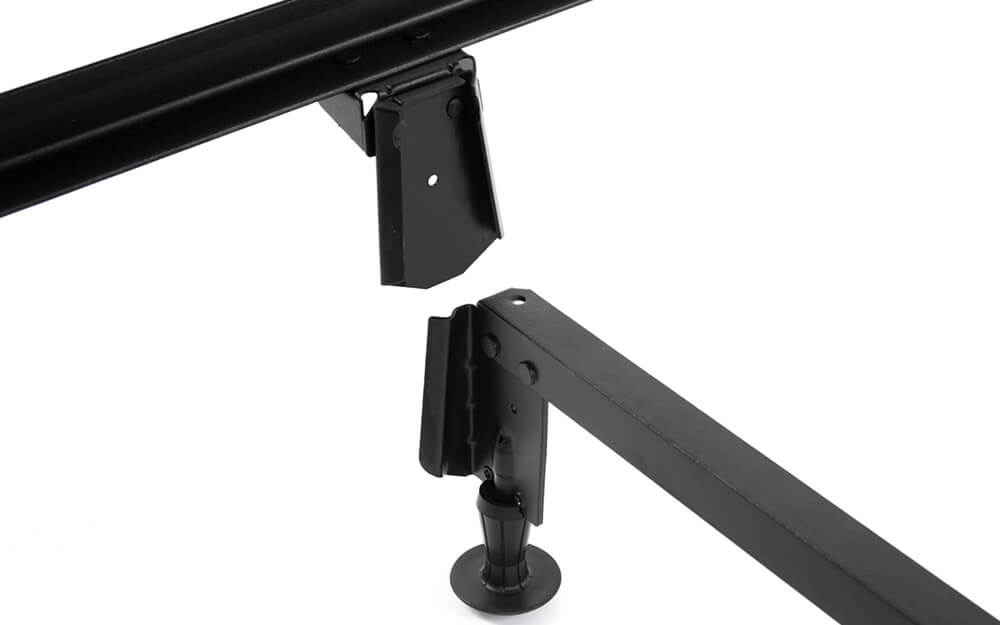 Logan & Cove metal bed frame’s side-rail wedge sliding into bracket