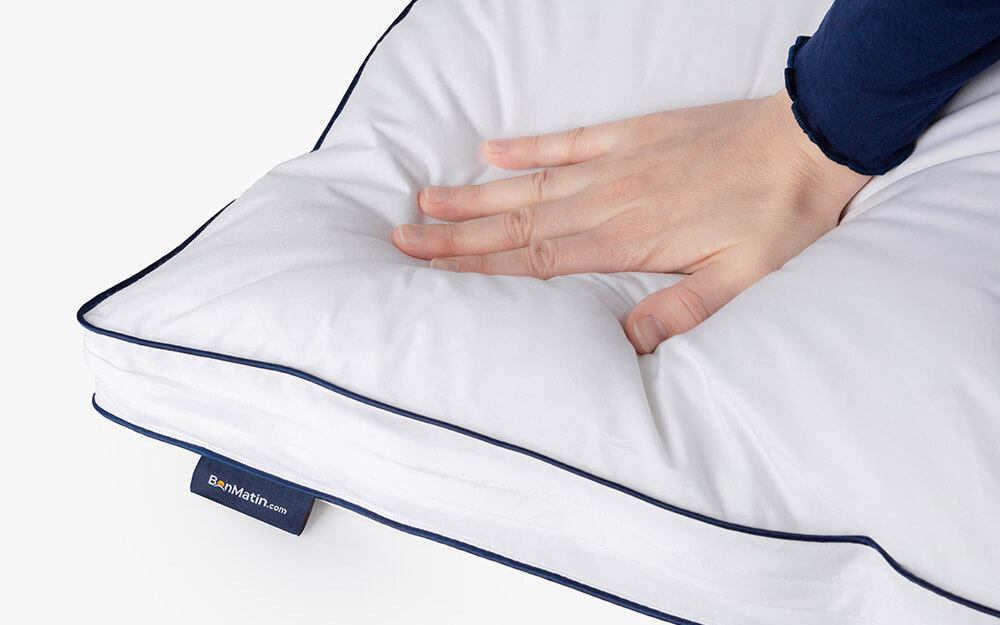 GM-Pillows-20210201-SML-F-5-1000x625 Hand pressing into the plush surface of the Adjustable Memory Foam Pillow
