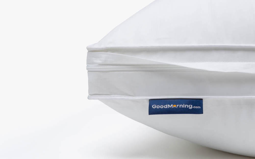 Close-up of the zipper hidden under a fabric flap on the Microfiber Pillow