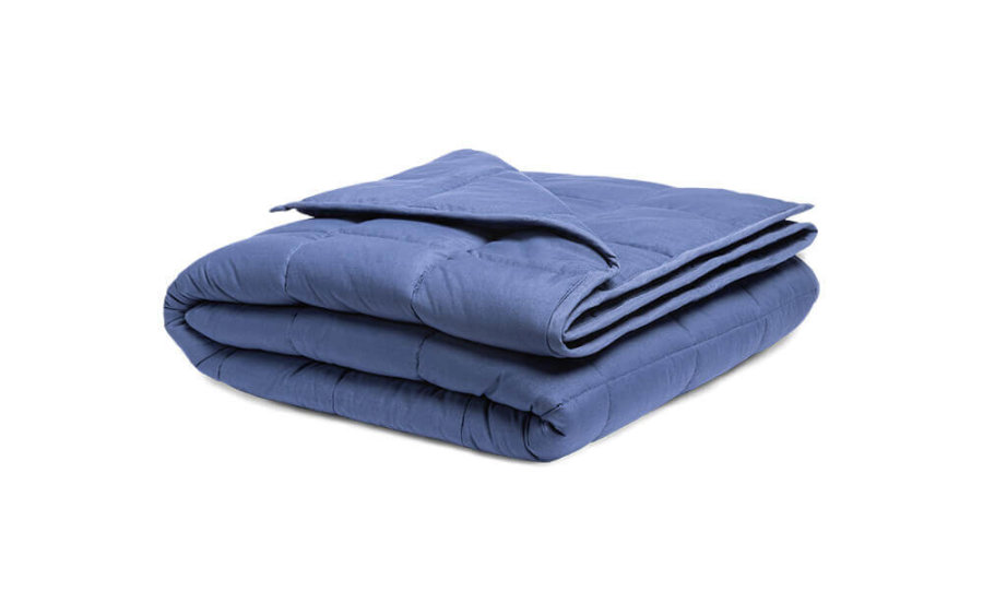 Classic Weighted Blanket folded neatly, with one corner pulled back