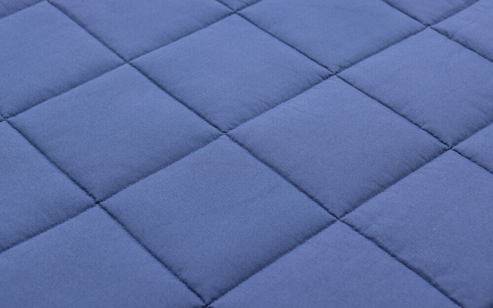 Closeup of the quilted panels and stitching on Classic Weighted Blanket