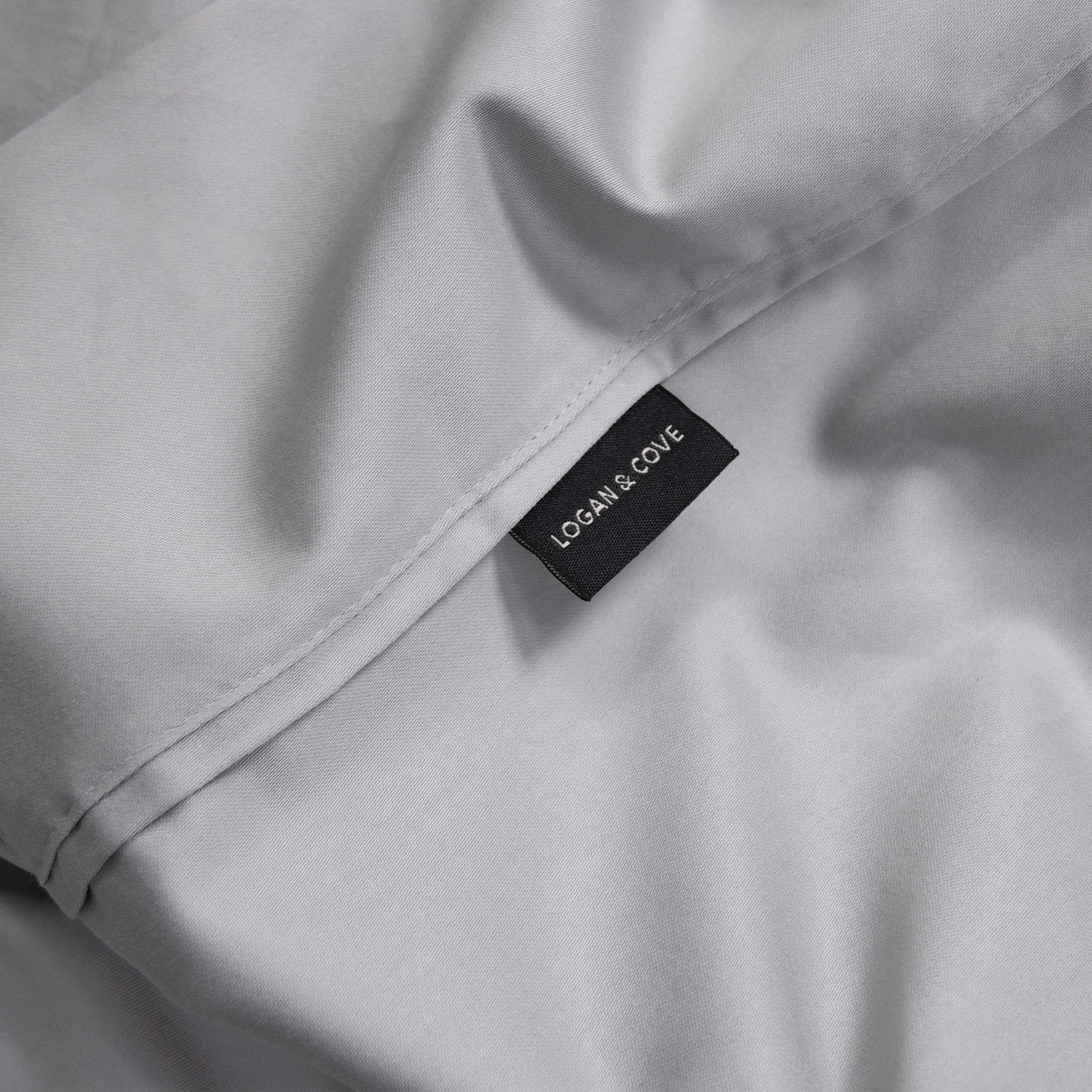LC-Egyptian-Cotton-Sheets-Carousel-4 Logan & Cove Egyptian Cotton Sheets in light grey colour with brand tag